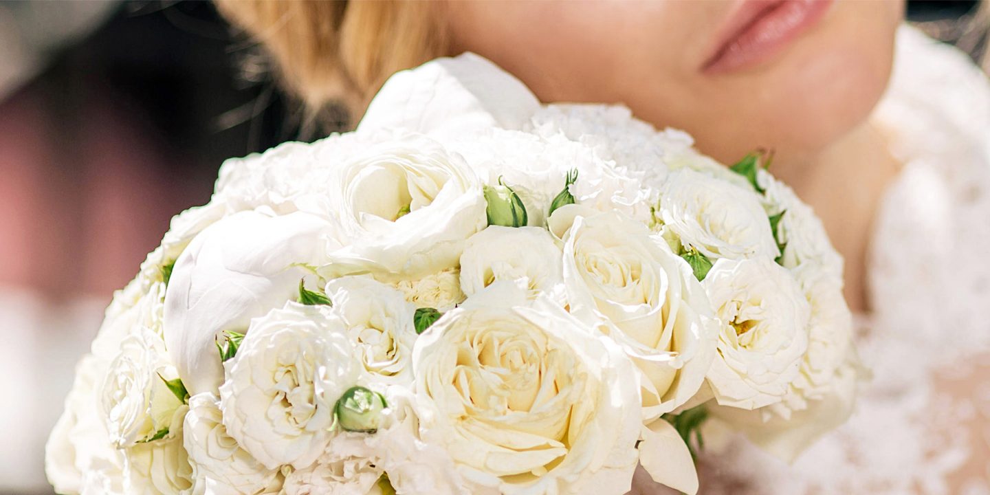 A Bride with wedding flowers at The Benjamin Hotel in NYC